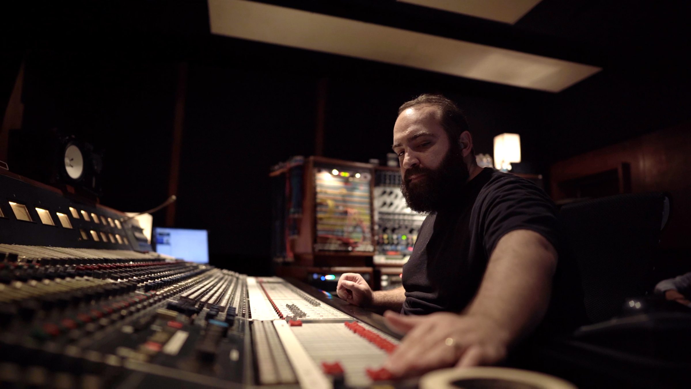 Michael Badal at the console in his hybrid analog/digital scoring studio